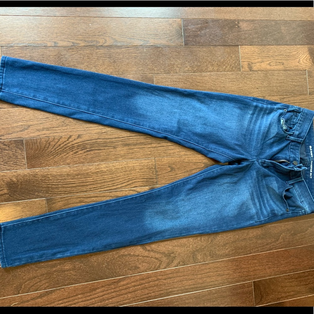 Dark colored tight jeans